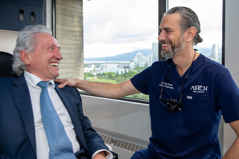 doctor consulting with patient smiling