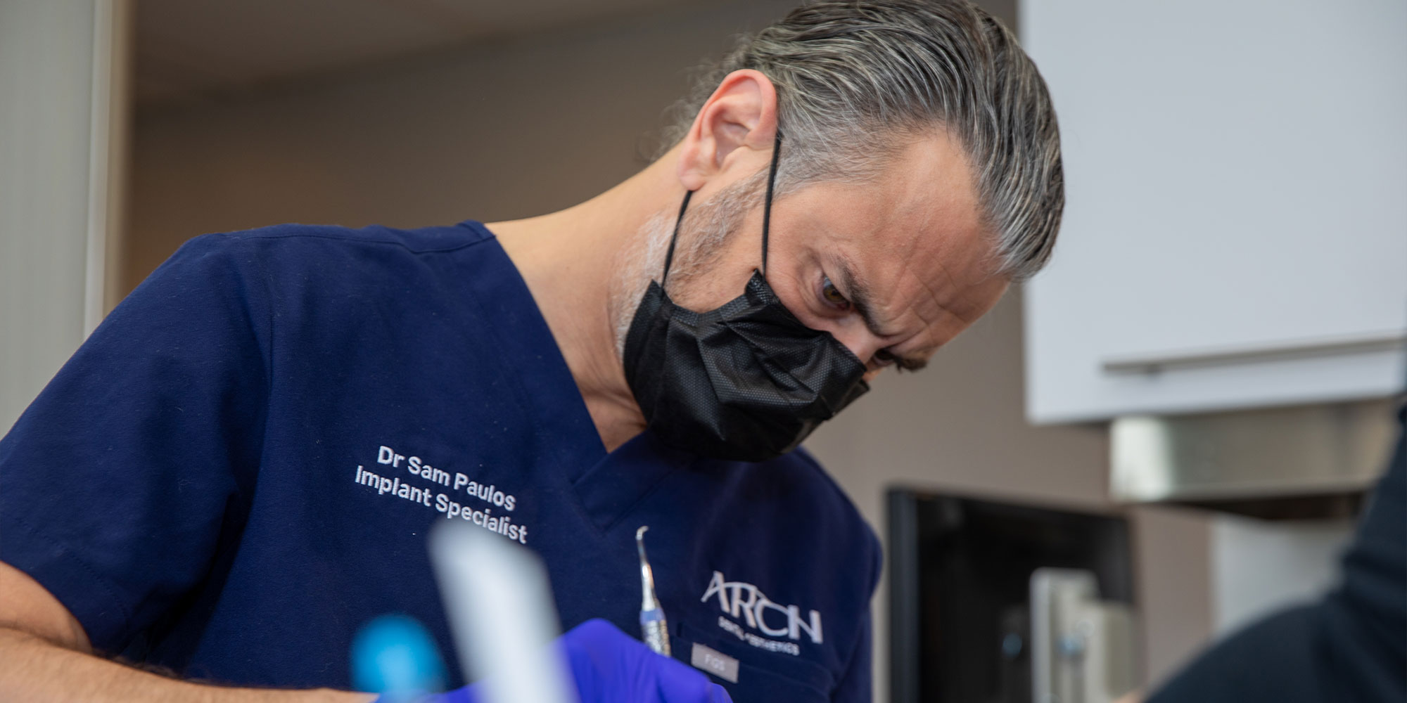 Doctor in dental implant procedure